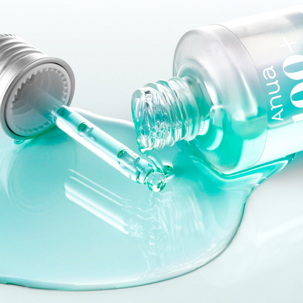 Anua PDRN Capsule 100 Serum showing suspended capsules in the aqua formula, front label detail